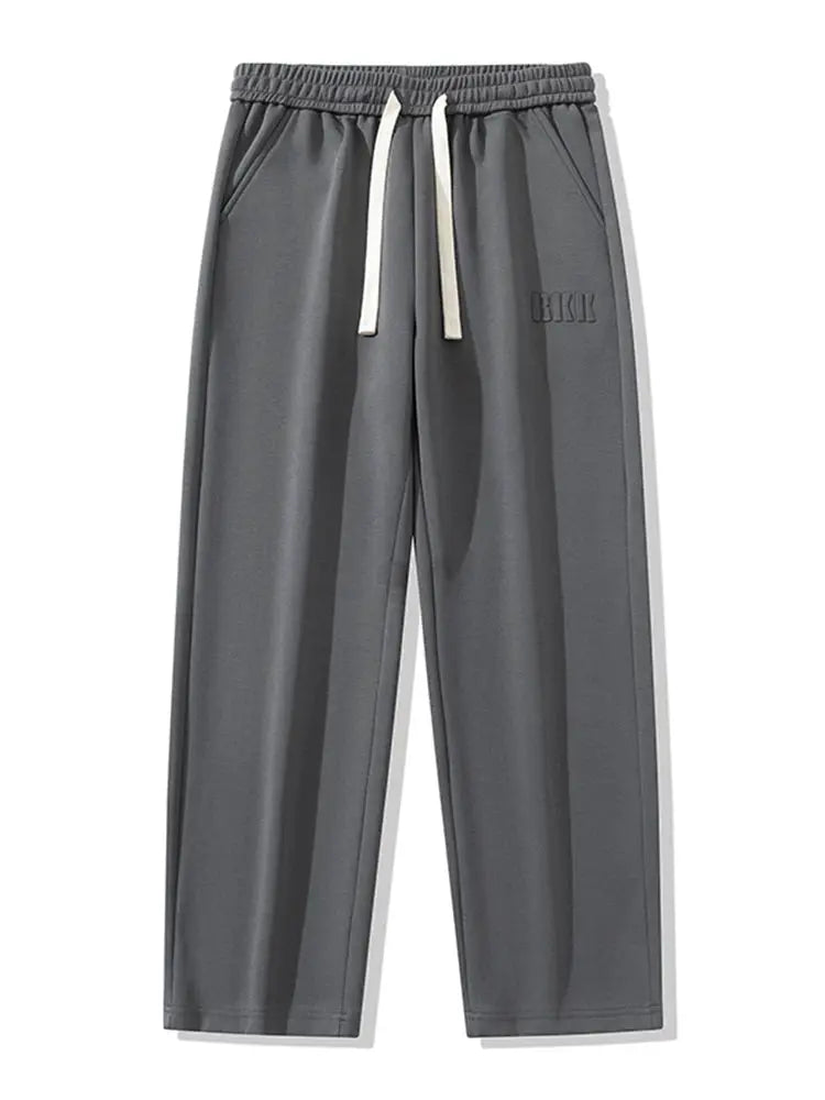 Men's grey cotton track pants with drawstring, wide-leg fit, BKK logo, Simples Market