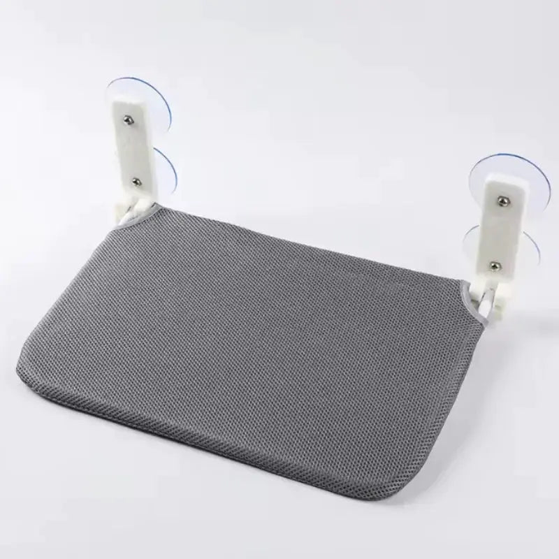 Cat hammock in gray mesh with white mounting brackets and suction cups