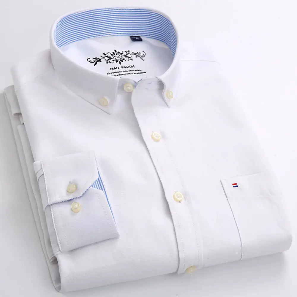 Men's white Oxford shirt by Simples Market, long sleeve button-down with blue striped inner collar and patch pocket.
