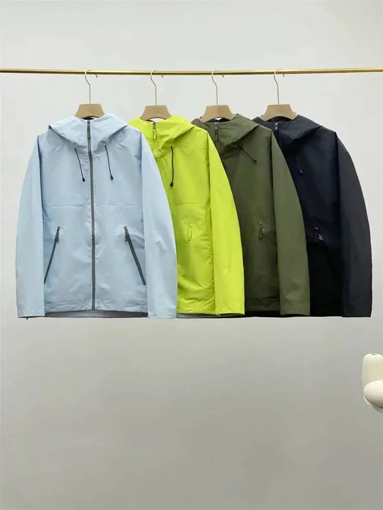 Men's windproof soft shell jackets, 4-pack in light blue, neon yellow, olive green, and black, with zipper pockets.