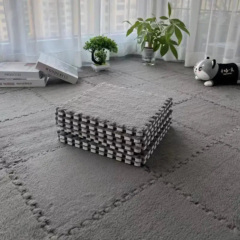 Plush puzzle foam floor mats, 10pcs of 30x30 cm interlocking gray tiles for a soft play area by Simples Market.