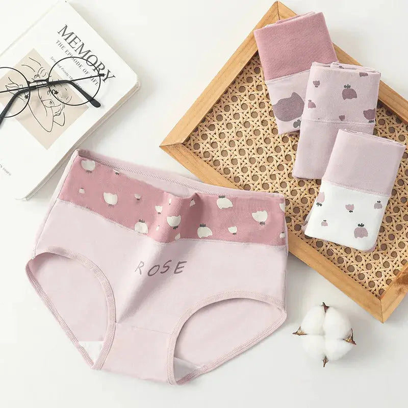 4-pack cotton women's panties in pastel pink, lilac, and white with rose-print patterns