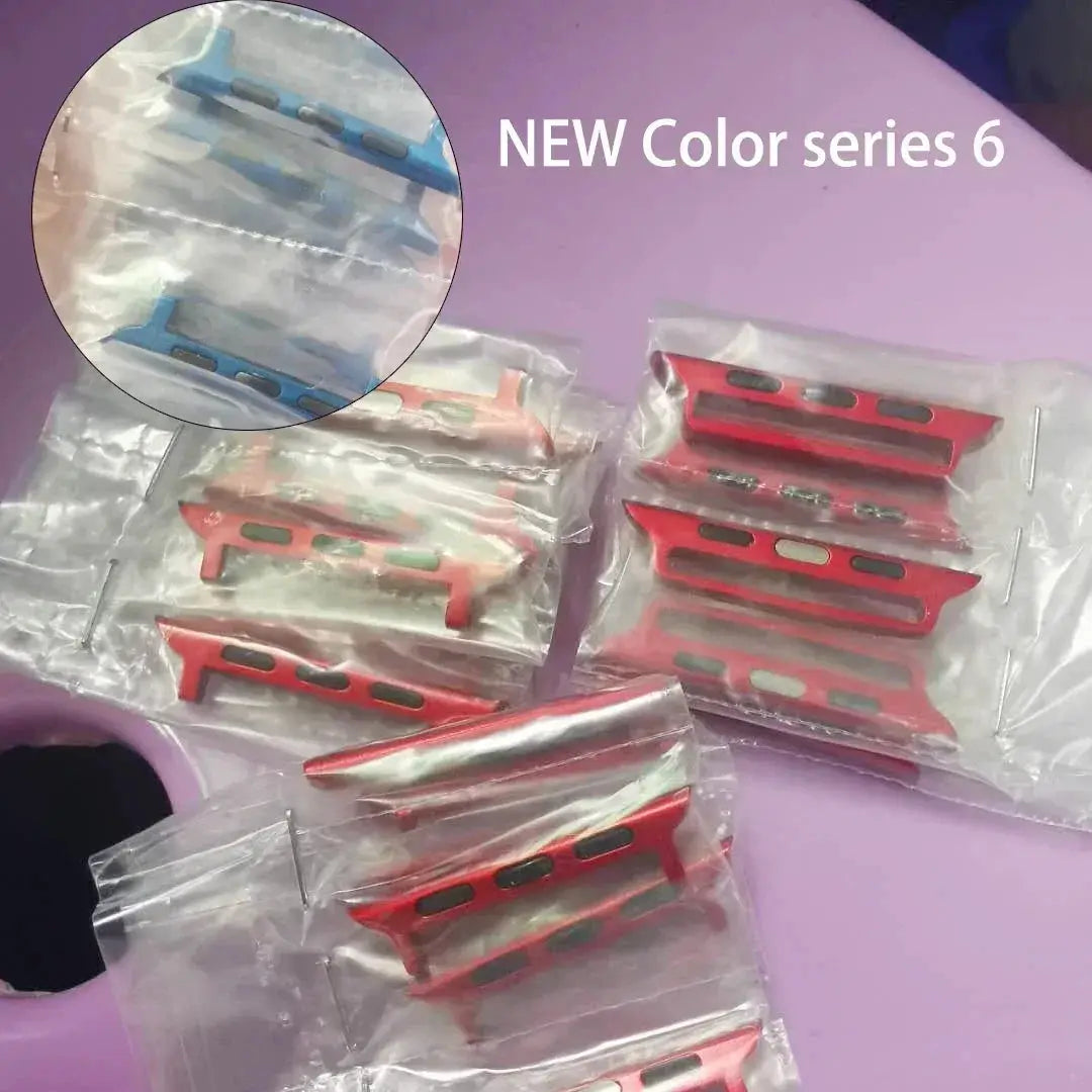 Simples Market Apple Watch band adapters set in red, pink and blue, multiple pieces in individual bags.