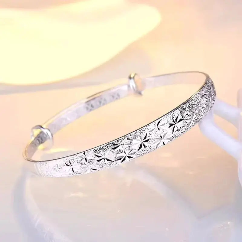 Sterling silver bangle bracelet with gypsophila star pattern for women