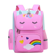 Children's unicorn backpack by Simples Market; pink with rainbow, clouds and light blue panels