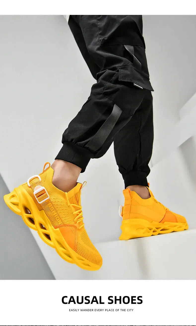 Sneakers pair in bright yellow mesh athletic shoes with a thick chunky sole, unisex casual footwear