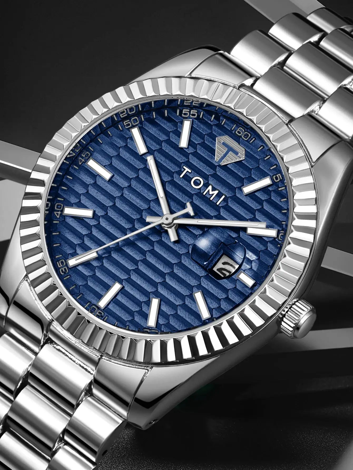 TOMI men's watch with blue textured dial and stainless steel strap, date display.