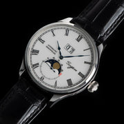 Sugess Tianjin ST25 automatic moonphase watch with white dial, Roman numerals, blue hands, black leather strap