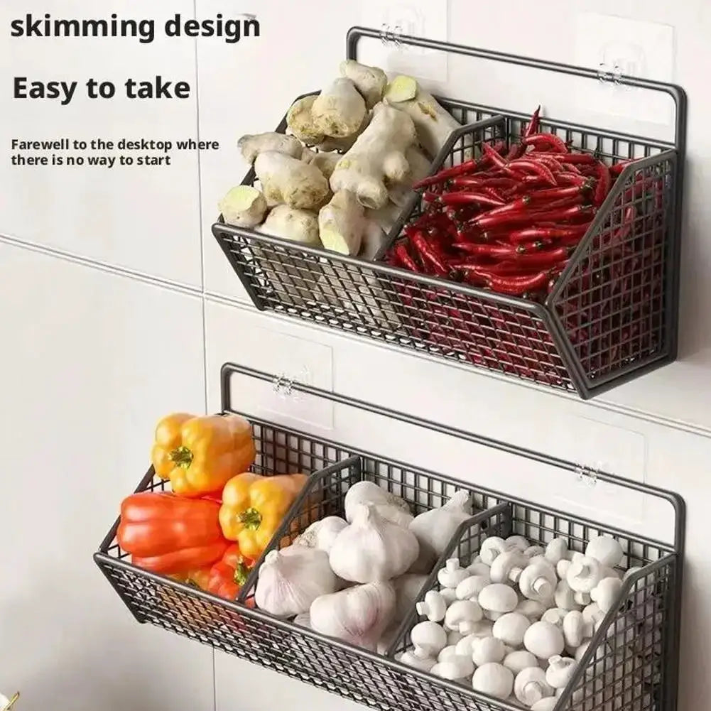 Two wall-mounted black metal wire storage baskets by Simples Market for spices, garlic, onions, and vegetables.