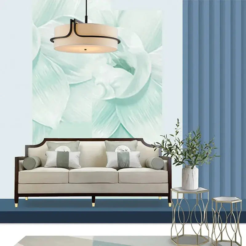Modern fabric art ceiling pendant light by Simples Market, black frame with beige drum shade.