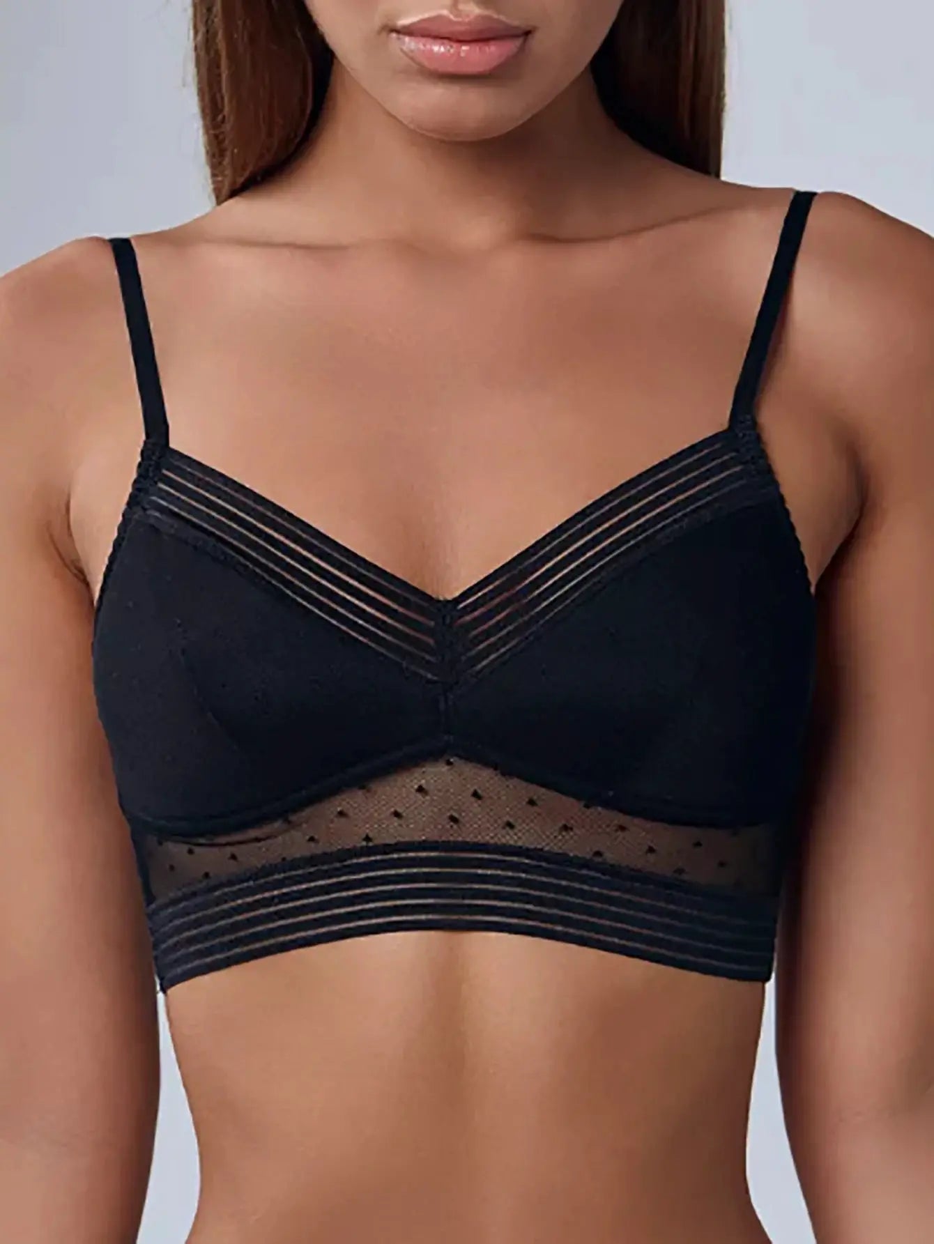Black lace bralette with thin straps and strappy V-neck; sheer dotted mesh band from Simples Market