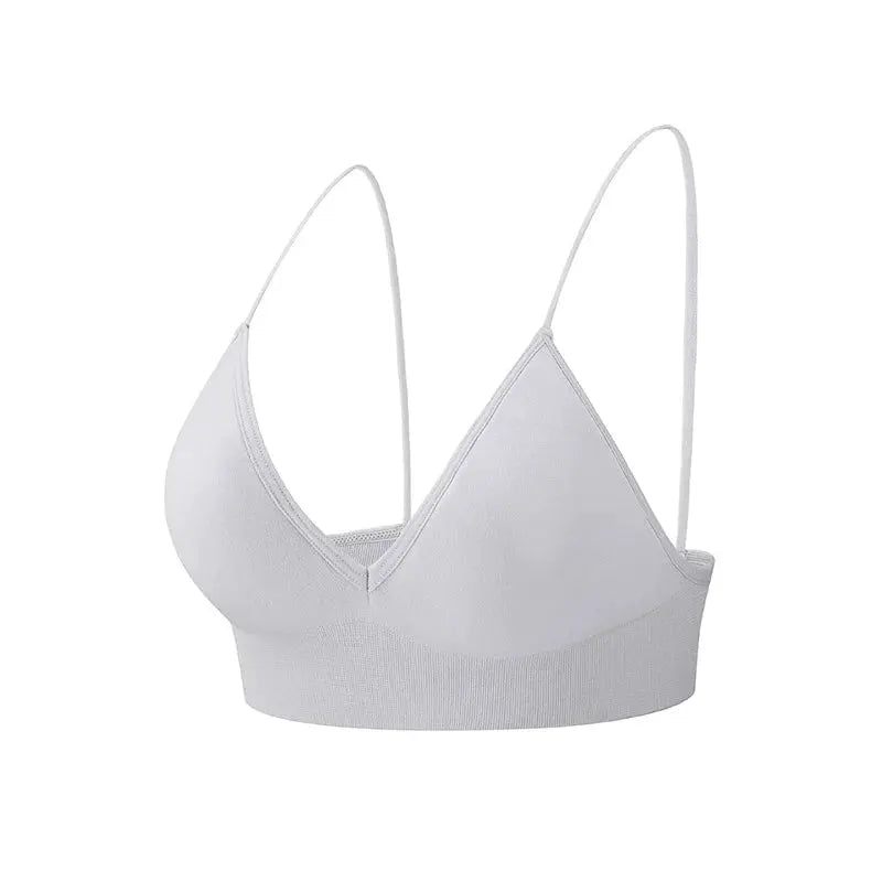 White triangle-cup bralette camisole with deep V-neck, thin straps, and wide elastic band