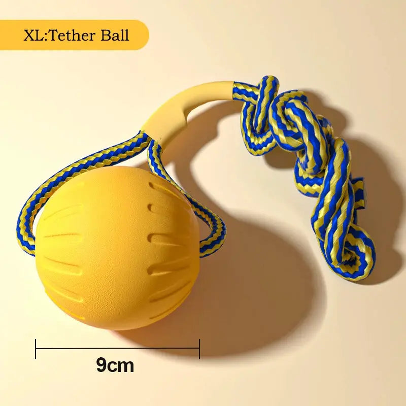 EVA dog ball with blue-yellow tether rope, 9 cm diameter, by Simples Market