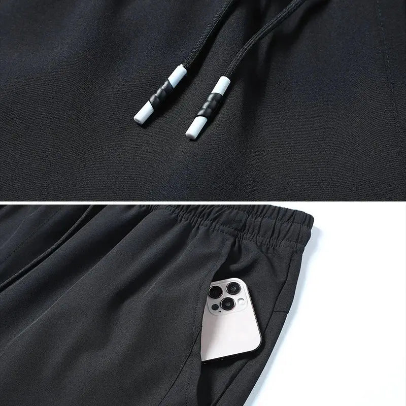 Black cooling ice-silk running pants with elastic waistband, drawstring and a phone pocket