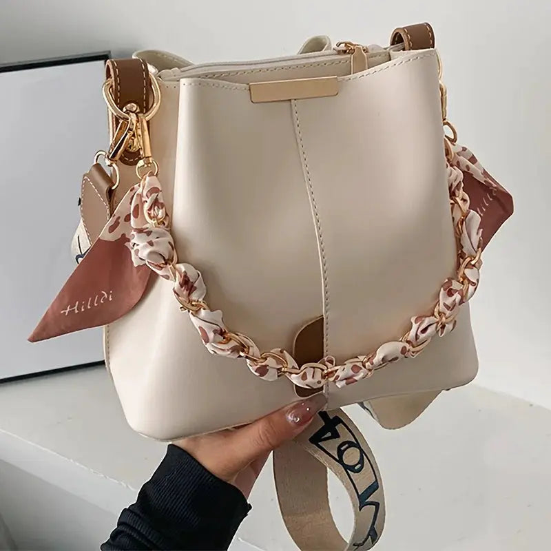 Bucket bag by Simples Market, beige large-capacity crossbody with ribbon chain strap