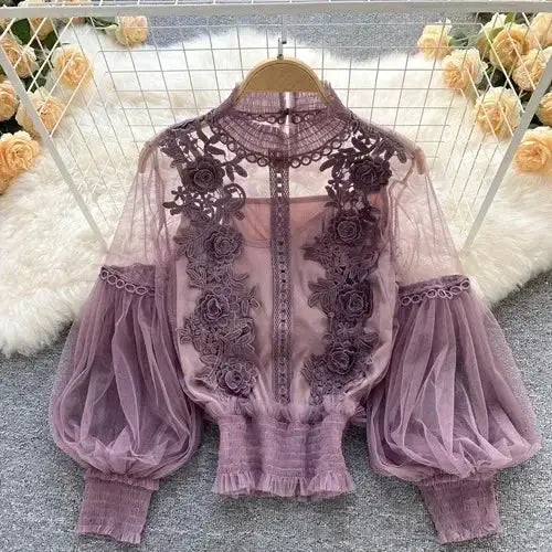 Lace puff long sleeve blouse in lavender with sheer floral embroidery.