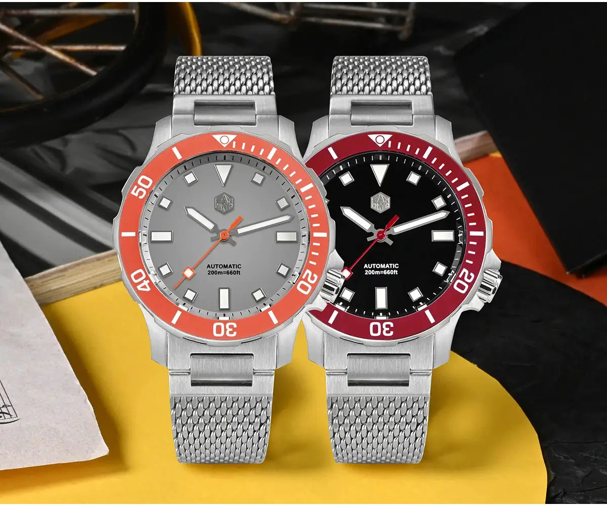 Two Simples Market San Martin diver watches, 39.5mm, Milanese mesh bracelets, gray dial with orange bezel and black dial with burgundy bezel