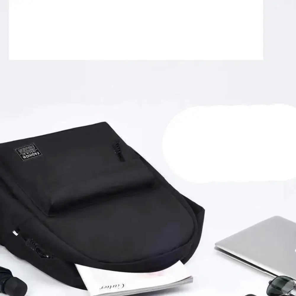 Men's black minimalist backpack with large capacity and laptop sleeve