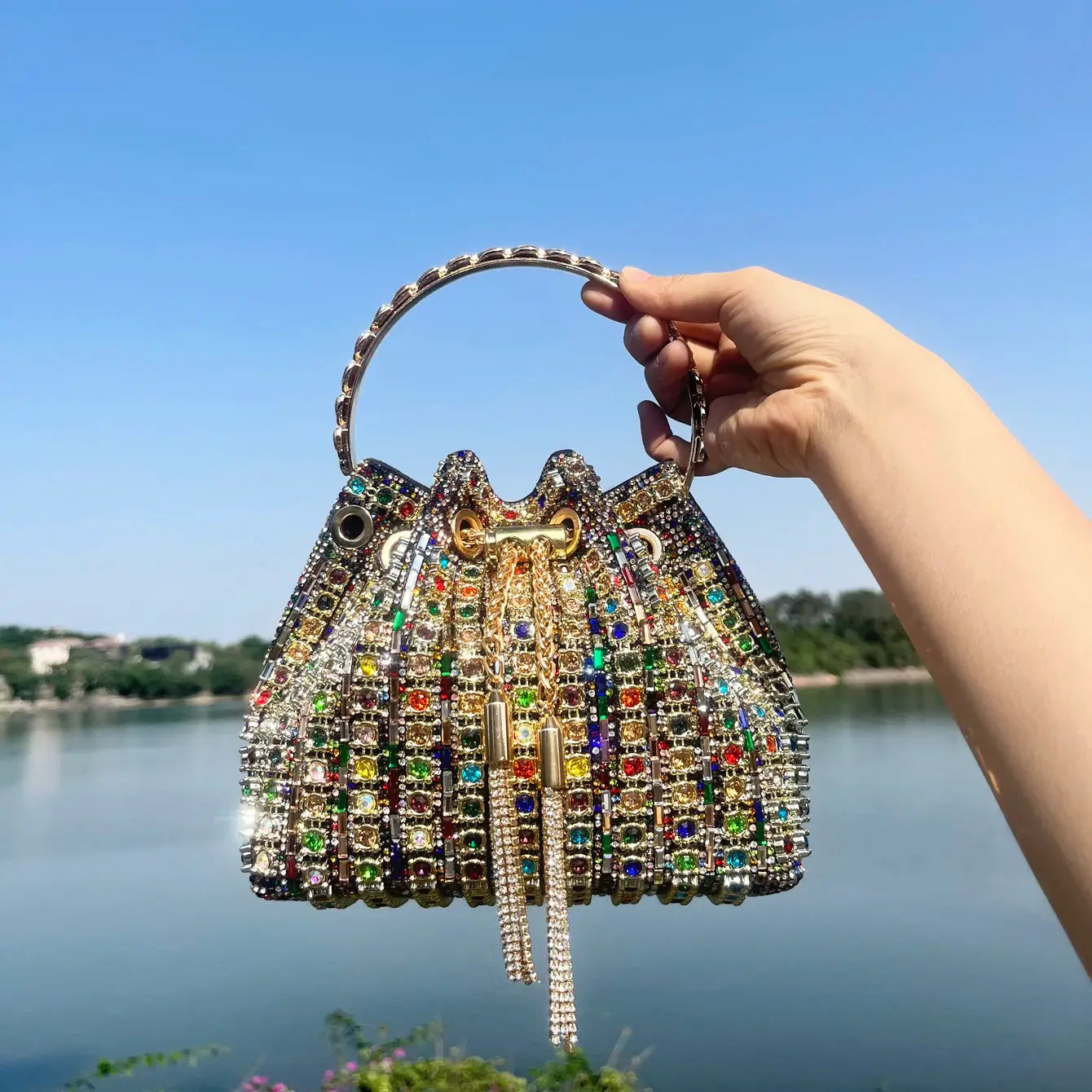 Crystal rhinestone bucket clutch purse with multicolor gems and gold-tone handle