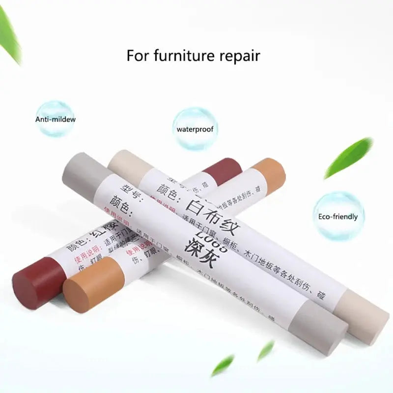 Five color-coded wood furniture repair pens set with white labels, arranged in a cluster.