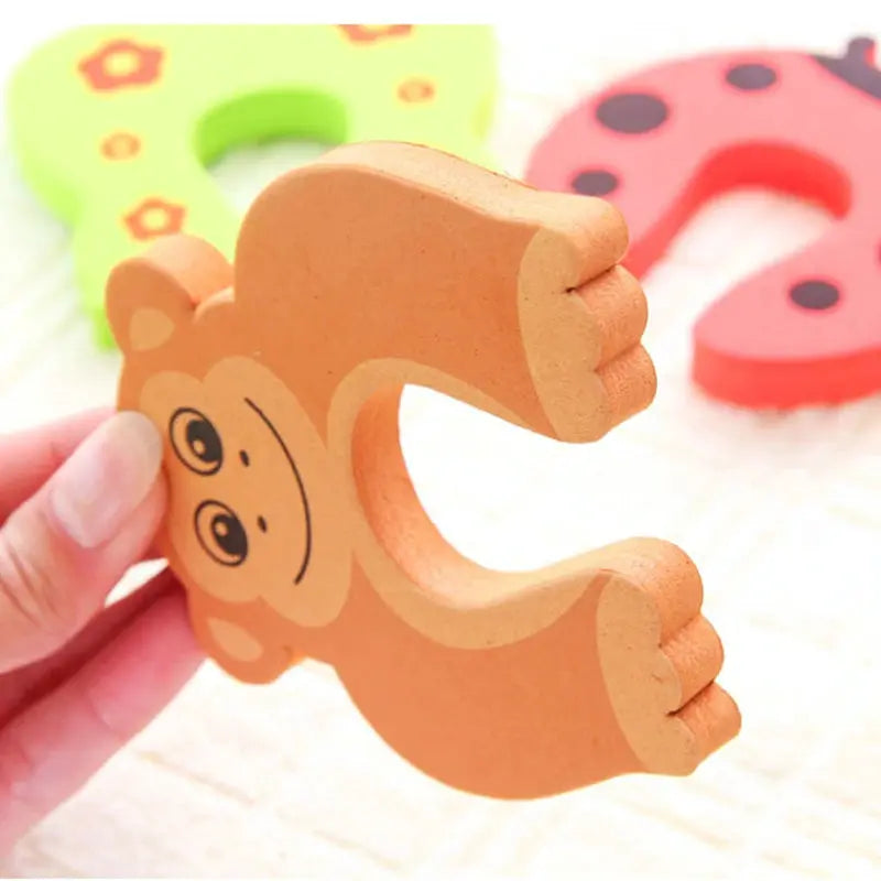 Monkey-shaped wooden baby door stopper, orange, anti-pinch finger protector