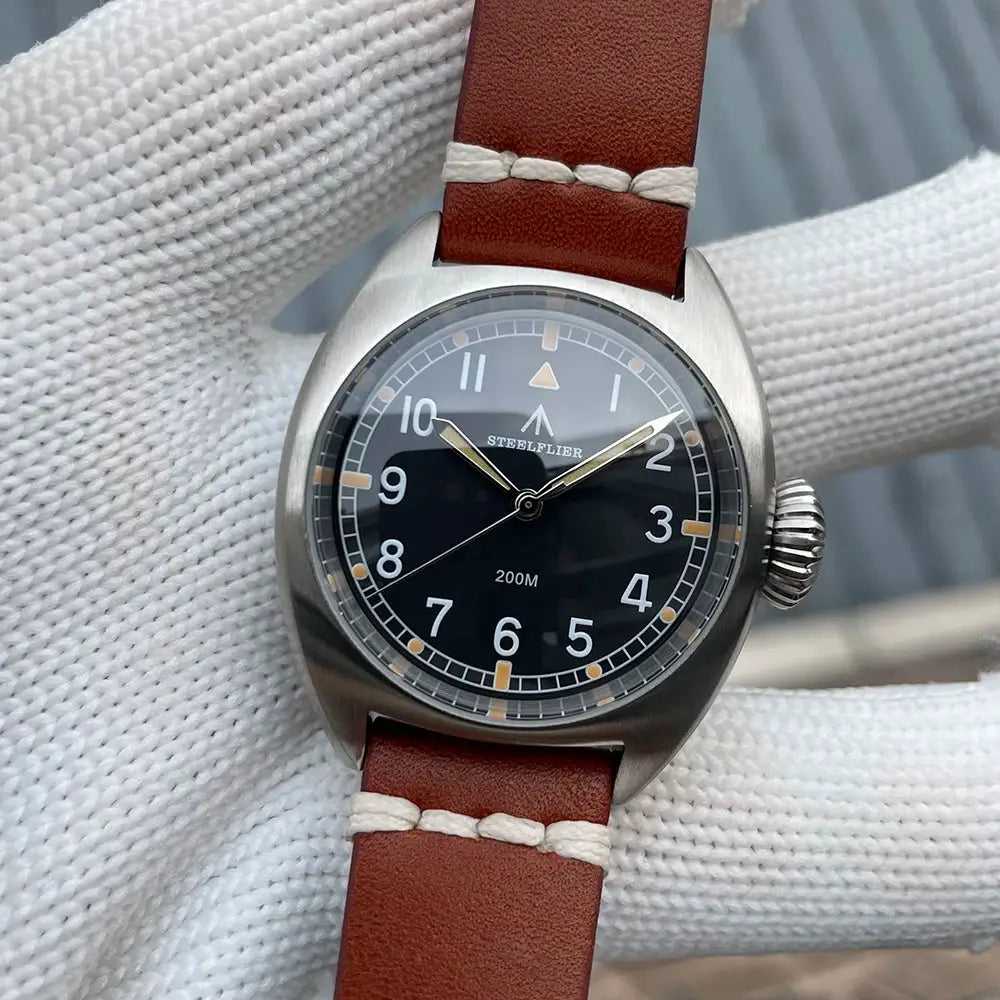 STEELFLIER SF745 unisex watch with 36mm steel case, black dial, brown leather strap, 200m water resistant