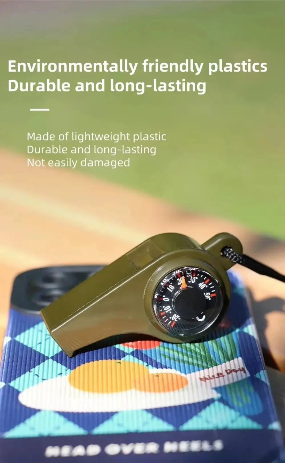 3-in-1 outdoor emergency whistle in olive-green with compass and thermometer.