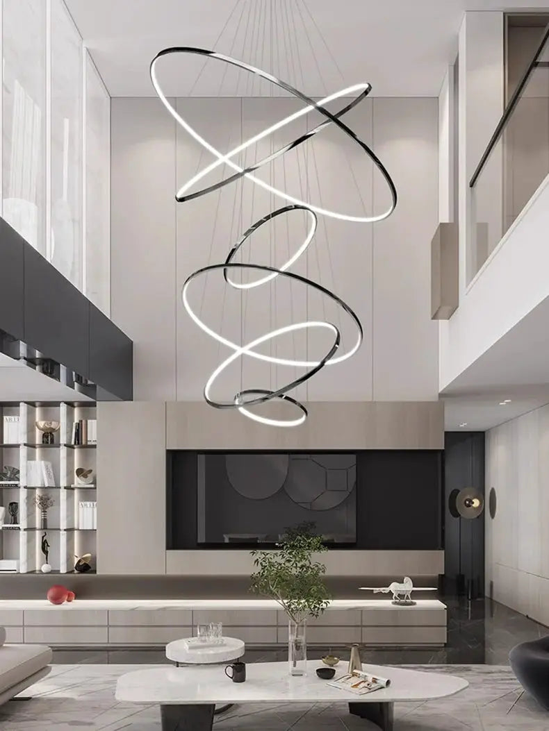 Pendant light by Simples Market, modern LED spiral chrome rings for living room