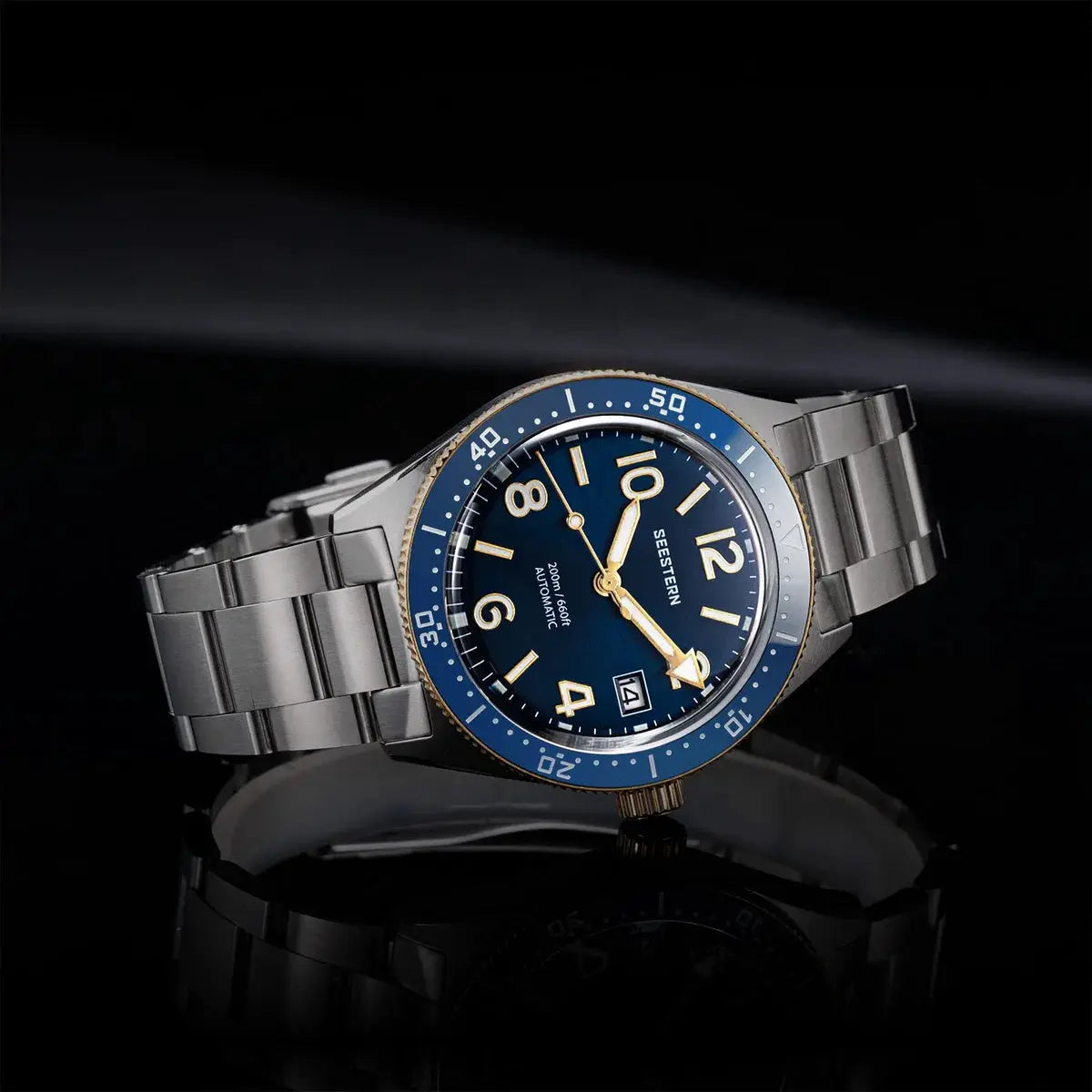 Seestern Diver men's automatic watch with blue dial, luminous gold-tone markers, blue bezel.