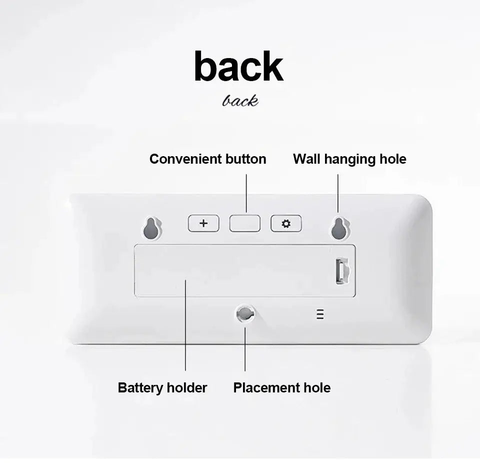 Simples Market LCD digital wall clock back view; white plastic, battery powered with wall-hanging holes and buttons.