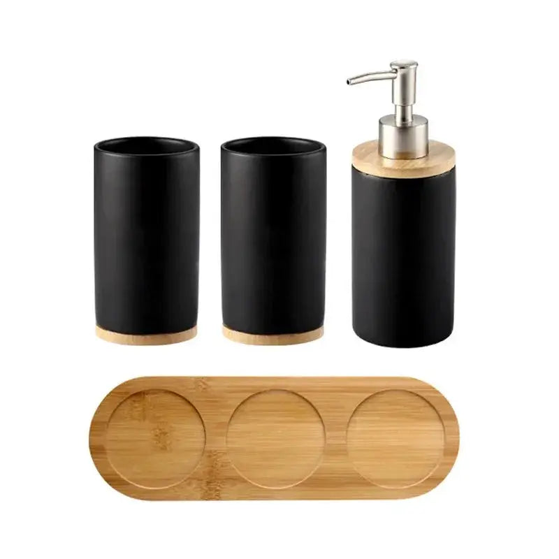 Ceramic bathroom accessories set of 4 by Simples Market with black soap dispenser, toothbrush holder, tumbler, and bamboo tray