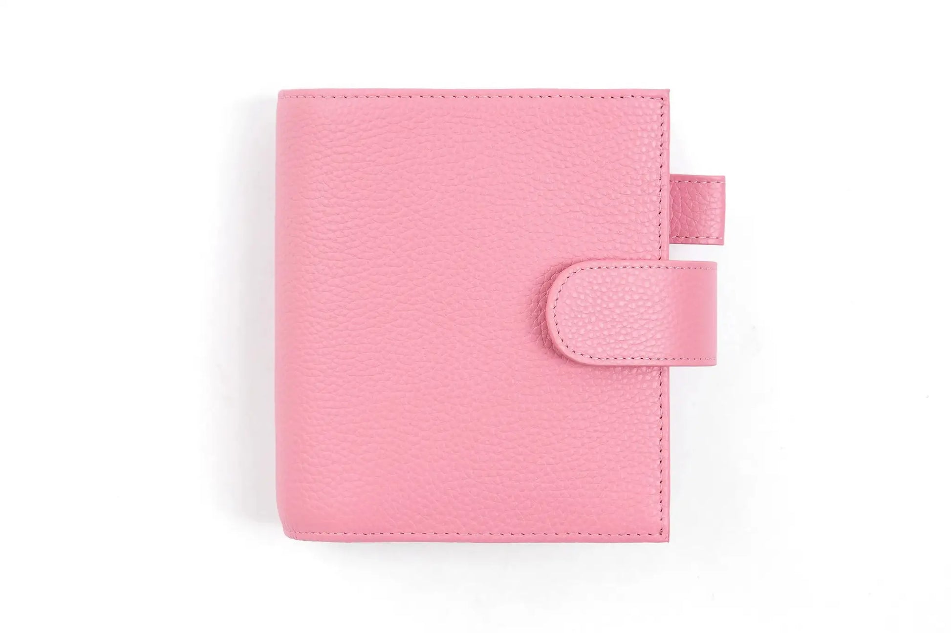 Moterm Luxe 2.0 pocket-size planner in pink pebbled leather with strap closure