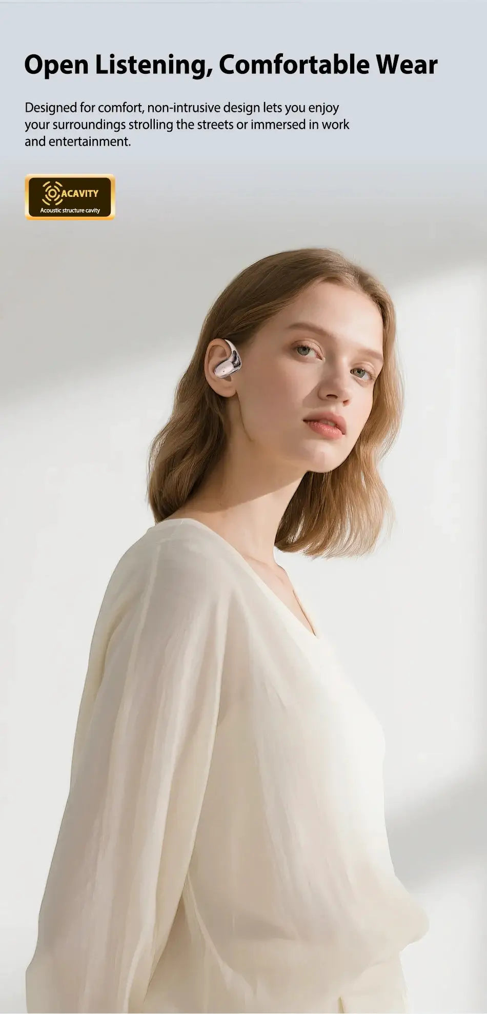 HTC NE35 wireless Bluetooth earphones, metallic silver in-ear headset worn by model