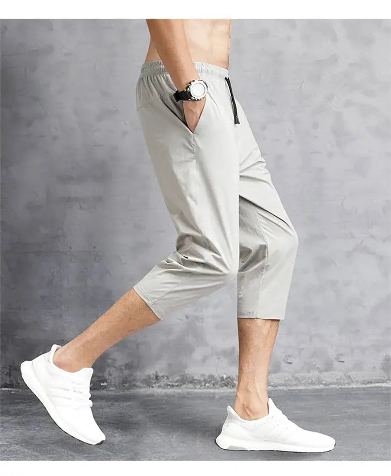 3/4 length men's shorts, light gray quick-dry nylon with elastic waistband