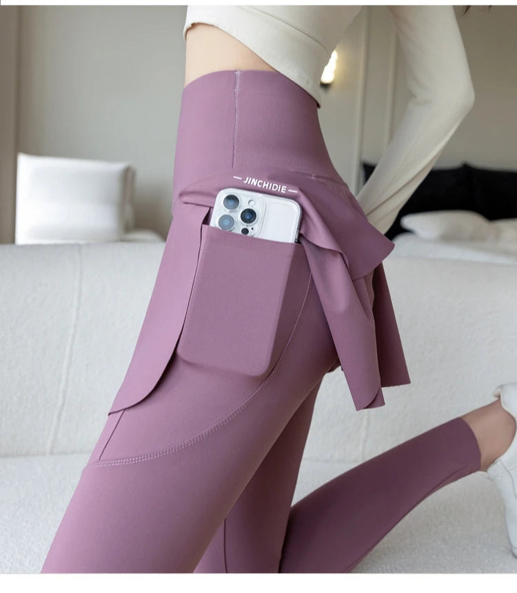 Women’s purple high-waist leggings with side pocket and wrap belt detail; JINCHDIE branding, Simples Market