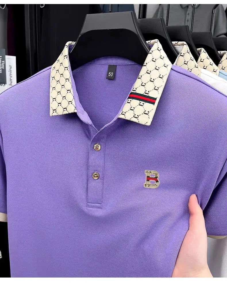 Polo shirt, purple short-sleeve with cream patterned collar and embroidered B logo on chest