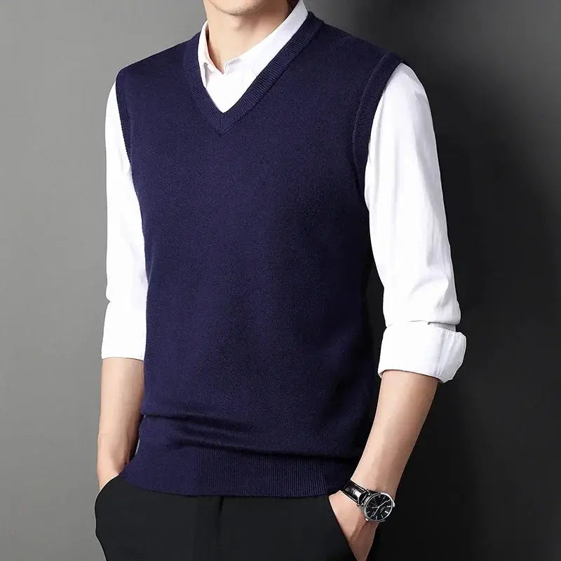 Men's navy V-neck knitted vest over white shirt, solid-color knitwear for smart casual