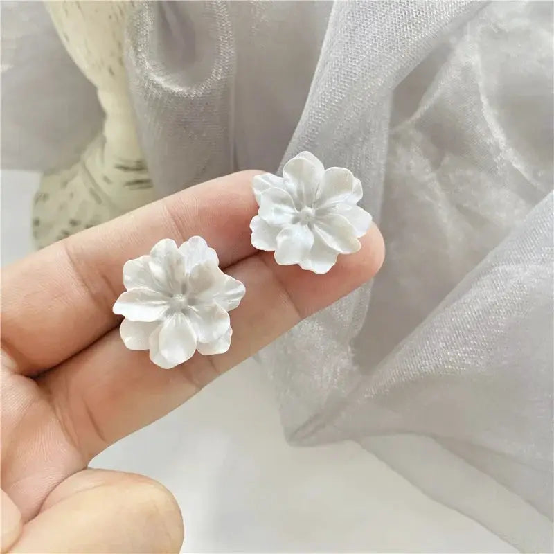 Pair of white camellia flower stud earrings for women