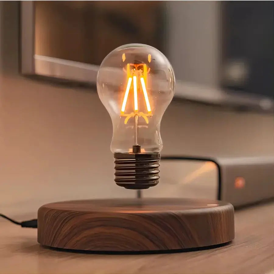 Magnetic Levitation Lamp by Simples Market with a floating glass LED bulb above a wooden base