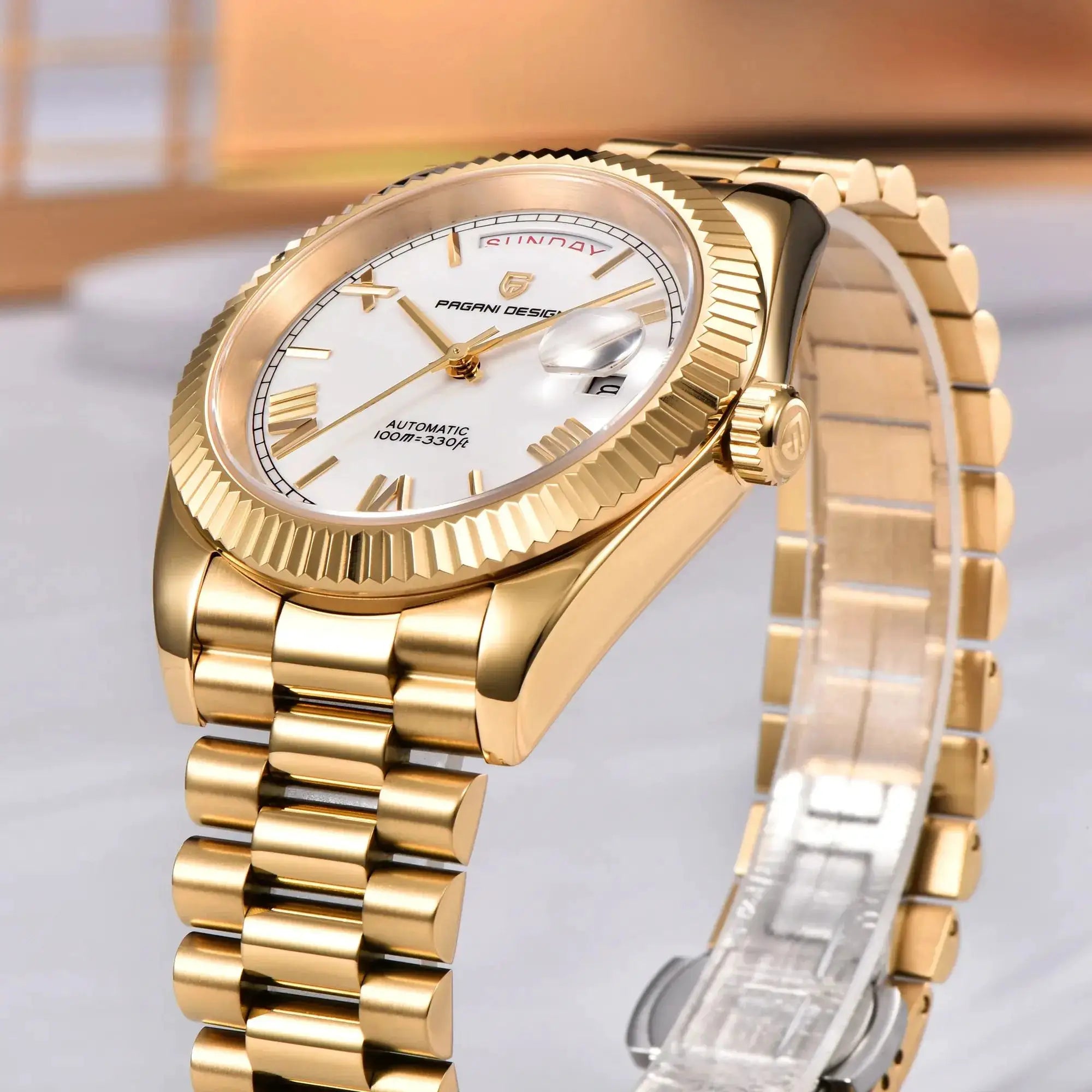 Pagani Design DD40 gold-tone men's watch with white dial, date window, automatic movement