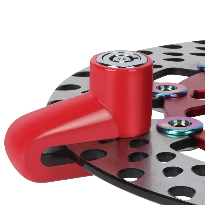 Motorcycle disc brake lock in red aluminum with perforated rotor, Simples Market