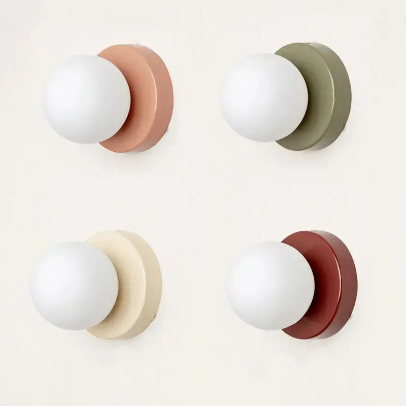 Macaron-style wall lamp set of 4 with iron bases and plastic ball shades; colorful finishes by Simples Market