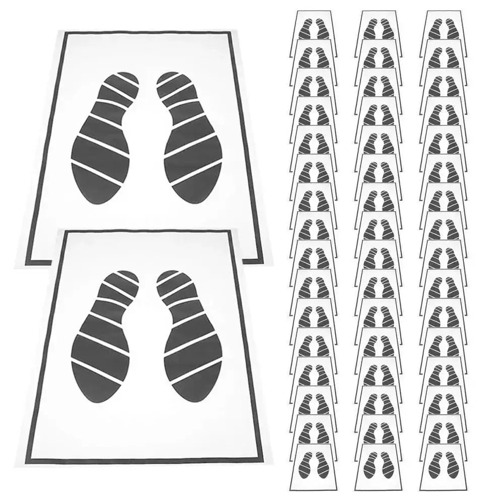 Disposable car floor mats 25 pieces, white with black footprint icons, waterproof anti-slip interior protection.