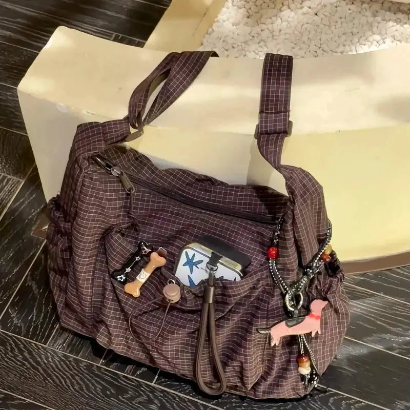 Korean nylon plaid shoulder bag by Simples Market with zipper tote and front pockets, crossbody style