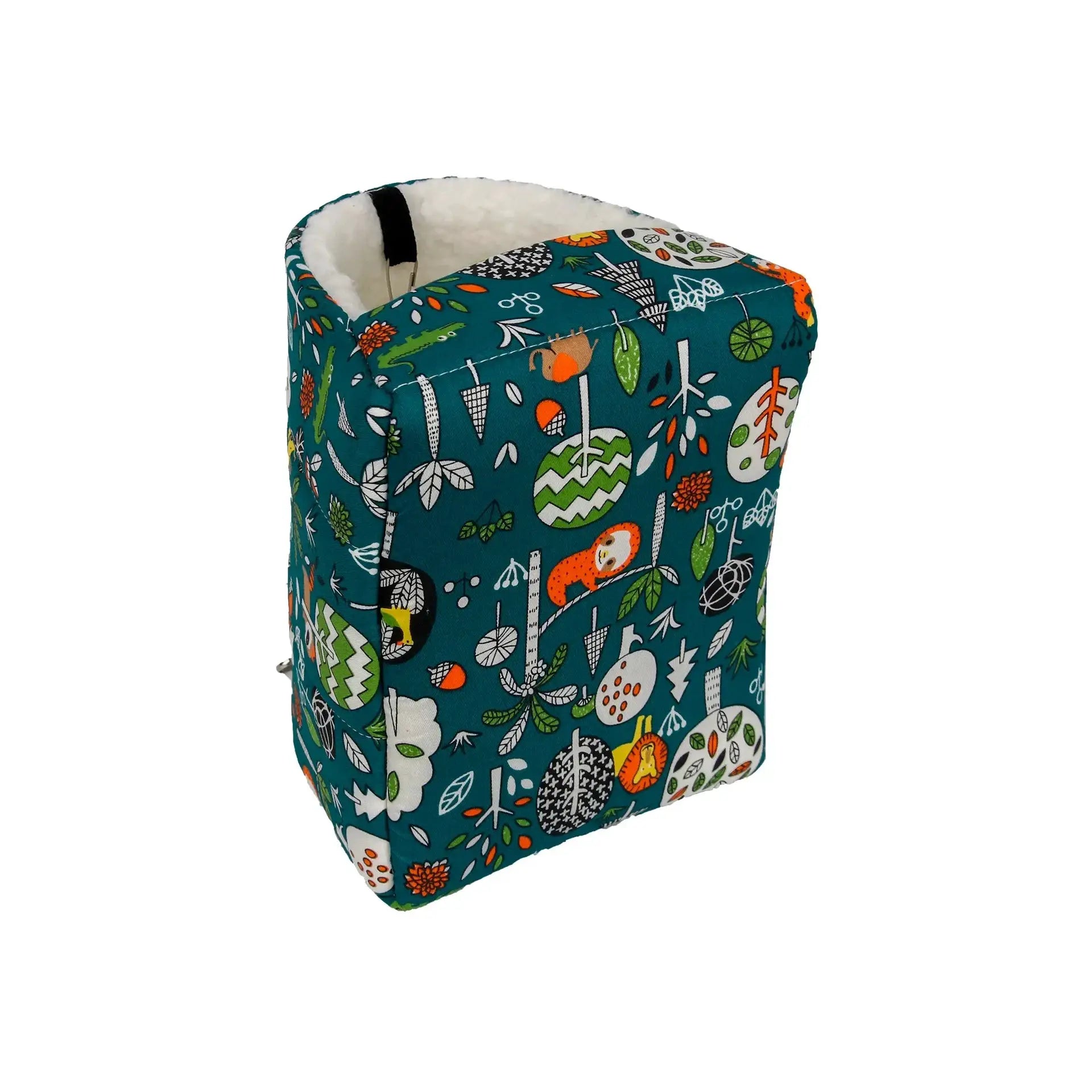 Small animal sleeping bed by Simples Market; teal printed fabric with botanical motifs and fluffy white lining