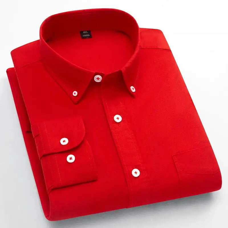 Men's red 100% cotton long-sleeve shirt by Simples Market with a single pocket, folded.