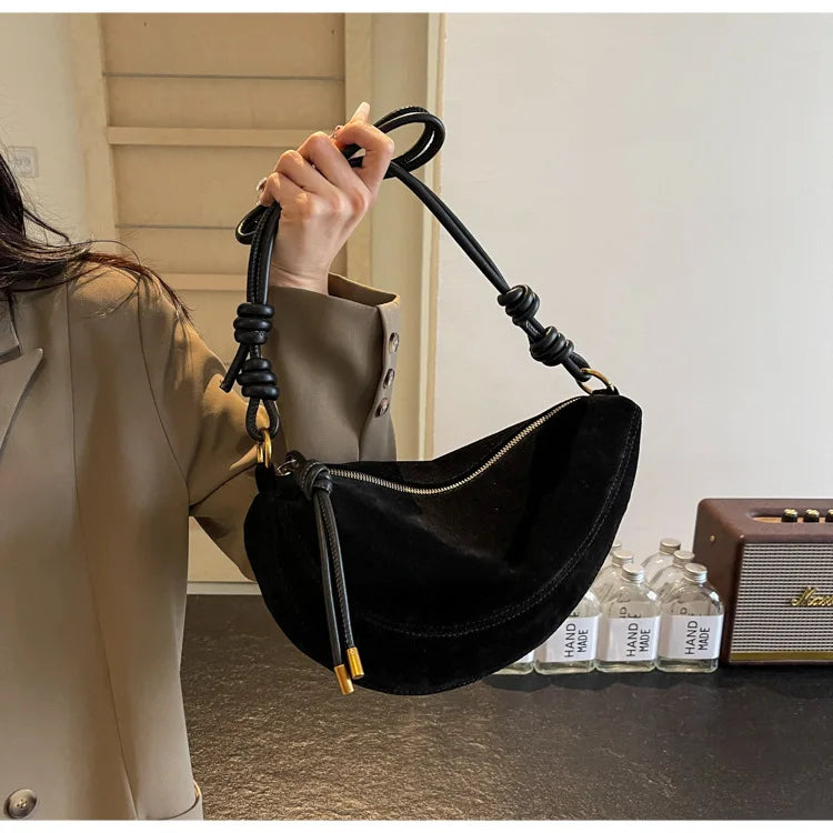 Simples Market faux suede shoulder bag for women, black crossbody with knotted strap and gold hardware
