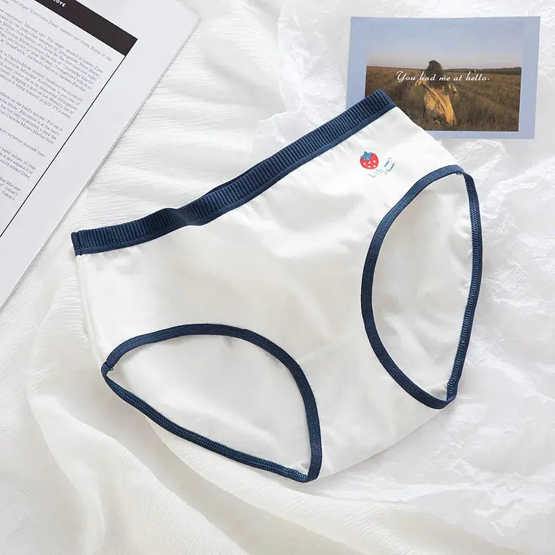 White cotton women’s underwear brief with navy trim and fruit cartoon print