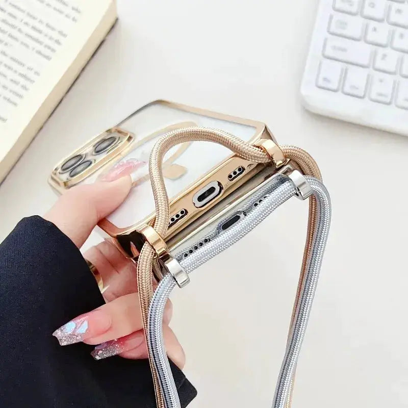 Crossbody plated iPhone case with dual metal lanyard cords in rose gold and silver
