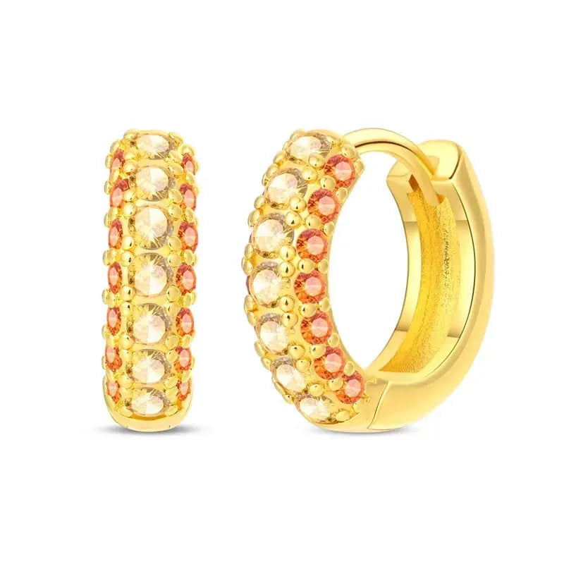 Golden hoop earrings with pink crystals and beaded pavé detail